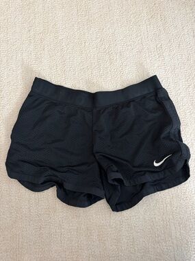 Nike Women's Black Athletic Mesh Shorts with White Swoosh